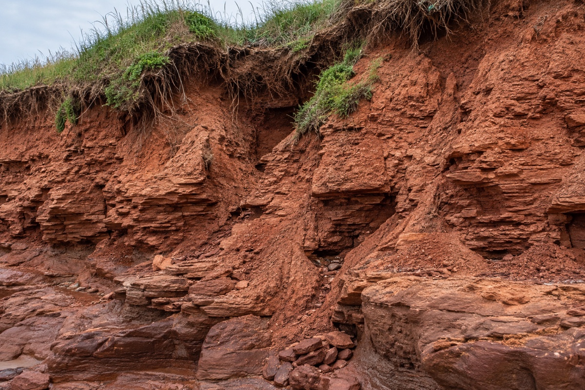 Close detail of eroding red sandstone cliff, Prince Edward Island